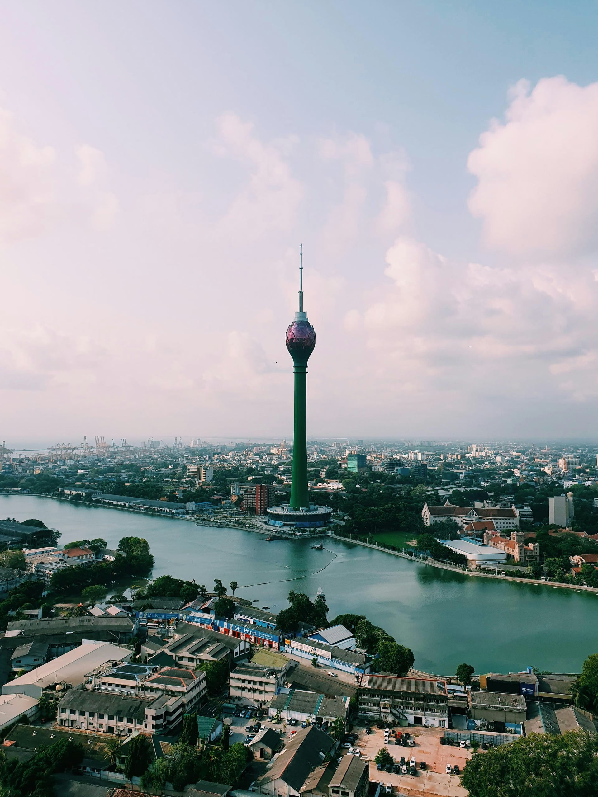 Colombo Lotus Tower landmark reflected in Beira Lake at dusk