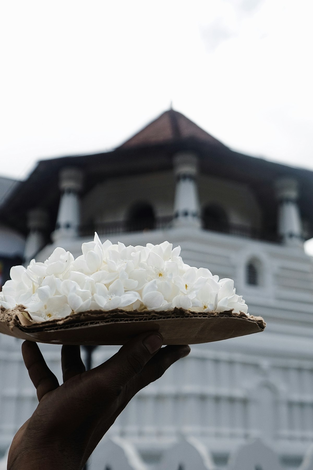 Temple of the Sacred Tooth Relic in Kandy at dusk